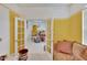 Den with view into dining room at 12902 Cattail Shore Ln, Riverview, FL 33579