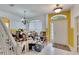 Dining room with chandelier, currently cluttered at 12902 Cattail Shore Ln, Riverview, FL 33579