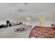 Large bonus room with a bedroom, bathroom, and plenty of storage space at 12902 Cattail Shore Ln, Riverview, FL 33579