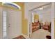 Bright entryway with access to den and dining room at 12902 Cattail Shore Ln, Riverview, FL 33579