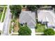 Aerial view of two-story house, driveway, and surrounding neighborhood at 12902 Cattail Shore Ln, Riverview, FL 33579
