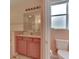Bathroom with single vanity, toilet, and neutral walls at 12902 Cattail Shore Ln, Riverview, FL 33579