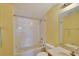 Simple bathroom with a tub, toilet, and vanity with a mirror at 12902 Cattail Shore Ln, Riverview, FL 33579