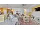 Bright living room features tile floors, and a neutral color palette at 12902 Cattail Shore Ln, Riverview, FL 33579