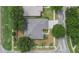 Aerial view of a single Gathering home with a gray roof and well manicured lawn at 12902 Cattail Shore Ln, Riverview, FL 33579