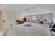 Large main bedroom with multiple windows and ceiling fan at 12902 Cattail Shore Ln, Riverview, FL 33579