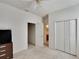 Spacious bedroom with double door closet and neutral carpeting at 12902 Cattail Shore Ln, Riverview, FL 33579