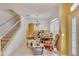 Dining room with chandelier and staircase at 12902 Cattail Shore Ln, Riverview, FL 33579