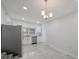 Modern kitchen with stainless steel appliances and white cabinets at 2601 N Wilder Loop, Plant City, FL 33565