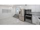 Modern kitchen with stainless steel appliances and white cabinets at 2601 N Wilder Loop, Plant City, FL 33565