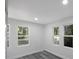 Spacious bedroom with multiple windows and wood-look floors at 2601 N Wilder Loop, Plant City, FL 33565
