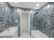 Modern bathroom with blue tile and walk-in shower at 2601 N Wilder Loop, Plant City, FL 33565