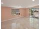 Living area with tile floors and sliding glass door at 2601 N Wilder Loop, Plant City, FL 33565