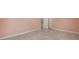 Spacious bedroom with light pink walls and tile floors at 2601 N Wilder Loop, Plant City, FL 33565