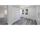 Bright bedroom with wood-look floors and double door closet at 2601 N Wilder Loop, Plant City, FL 33565