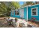 Renovated light blue house with a small porch at 2601 N Wilder Loop, Plant City, FL 33565