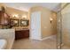 Elegant bathroom with double sinks, a soaking tub, and a separate shower at 1512 Parilla Cir, Trinity, FL 34655