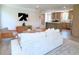 Open living room with a view into the kitchen and dining area at 17476 Quentin Ave, Port Charlotte, FL 33954