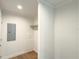 Small laundry room with shelving and electrical panel at 17476 Quentin Ave, Port Charlotte, FL 33954