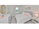 Charming bedroom with a full bed and dresser at 9018 Rally Spring Loop, Wesley Chapel, FL 33545