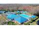 This community features a large pool, a slide, tennis courts, and several buildings for its residents at 28330 Openfield Loop, Wesley Chapel, FL 33543