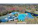 Aerial view highlights community amenities, including pools, basketball court, playground, and well-kept common areas at 28330 Openfield Loop, Wesley Chapel, FL 33543