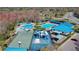 Aerial view featuring the community's swimming pools, basketball court, playground, and well-maintained facilities at 28330 Openfield Loop, Wesley Chapel, FL 33543