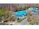 Aerial showcases the community center with its inviting entrance, ample parking, and landscaped surroundings at 28330 Openfield Loop, Wesley Chapel, FL 33543