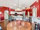 Dining room with view to the kitchen and living room, ideal for entertaining and Gathering gatherings at 28330 Openfield Loop, Wesley Chapel, FL 33543