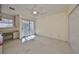 Bright bedroom with sliding glass doors to a balcony and built-in desk at 5203 Bayshore Blvd # 6, Tampa, FL 33611