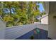 Private deck with seating and treetop views at 5203 Bayshore Blvd # 6, Tampa, FL 33611