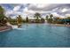 Large community pool with water slide and playground at 3831 Evergreen Oaks Dr, Lutz, FL 33558