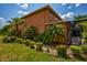 House exterior showcasing landscaping and walkway at 3831 Evergreen Oaks Dr, Lutz, FL 33558