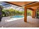 Relaxing screened pool and spa with spacious patio area at 3831 Evergreen Oaks Dr, Lutz, FL 33558