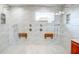 Spacious bathroom with double shower heads and built-in seats at 3831 Evergreen Oaks Dr, Lutz, FL 33558
