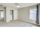 Spacious bedroom with large closet and neutral wall color at 3831 Evergreen Oaks Dr, Lutz, FL 33558