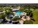 Aerial view of community pool, playground, and clubhouse at 3831 Evergreen Oaks Dr, Lutz, FL 33558