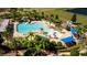 Resort-style pool with water slide, playground, and expansive deck at 3831 Evergreen Oaks Dr, Lutz, FL 33558