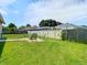 Large backyard with fire pit and plenty of space for outdoor activities at 28330 Openfield Loop, Wesley Chapel, FL 33543