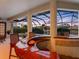 Elegant bar area with views of the screened pool area and waterway at 5510 E Longboat Blvd, Tampa, FL 33615