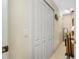 Hallway with large closets and neutral carpet at 5510 E Longboat Blvd, Tampa, FL 33615