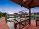 Inviting covered pier with a railing and seating, providing scenic views of the tranquil canal at 5510 E Longboat Blvd, Tampa, FL 33615