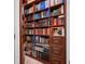 Built-in library with extensive shelving for books at 5510 E Longboat Blvd, Tampa, FL 33615