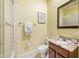 Small bathroom with shower/tub combo and granite vanity at 5510 E Longboat Blvd, Tampa, FL 33615