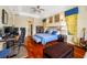 Spacious main bedroom with hardwood floors, a sitting area, and access to the ensuite bathroom at 5510 E Longboat Blvd, Tampa, FL 33615