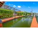 Private dock with boardwalk access to the water at 5510 E Longboat Blvd, Tampa, FL 33615