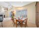 Charming breakfast nook with a wood table and four chairs, adjacent to the kitchen at 5510 E Longboat Blvd, Tampa, FL 33615