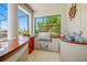 Outdoor kitchen with grill and ample counter space at 5510 E Longboat Blvd, Tampa, FL 33615