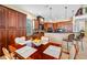 Well-equipped kitchen with wooden cabinetry and breakfast nook at 5510 E Longboat Blvd, Tampa, FL 33615