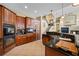 Bright kitchen boasts granite counters, custom cabinetry, and high-end appliances at 5510 E Longboat Blvd, Tampa, FL 33615